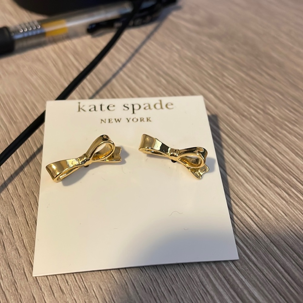 New never used gold fill Kate Spade earrings